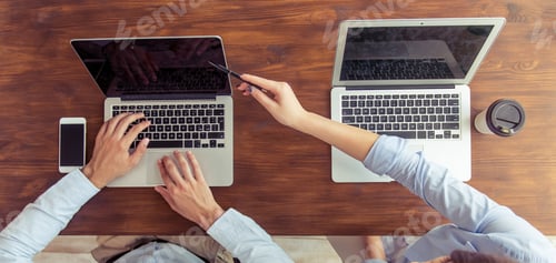 Preview: Beautiful business couple working