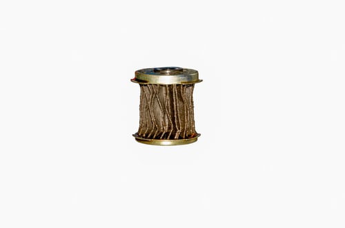 Preview: Shot of an old and used filter element isolated on a white background