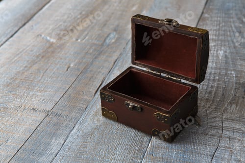 Preview: Wooden chest or trunk at serenity wood background
