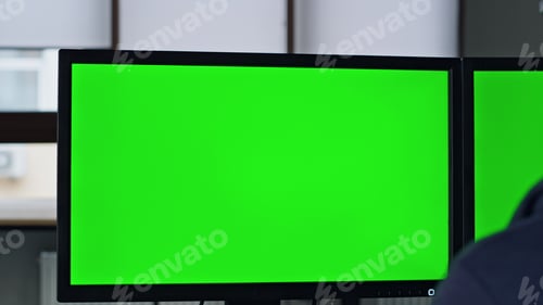 Preview: Closeup chromakey screen in office. It manager working on template computer