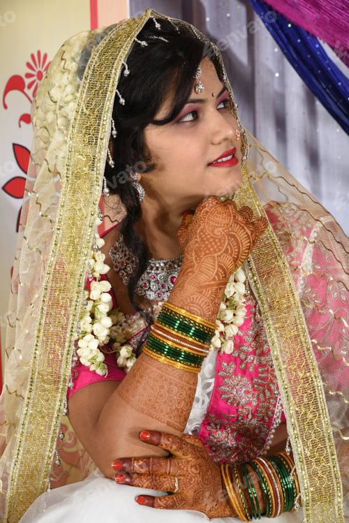 Preview: Indian bride wearing traditional wedding cloths in marriage ceremony.