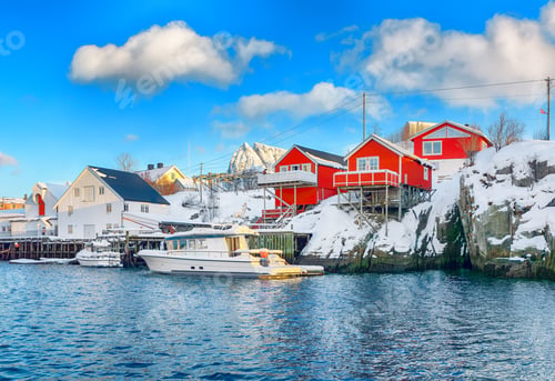 Preview: Traditional Norwegian red wooden houses (rorbuer) on the shore of Reinefjorden near Hamnoy village.