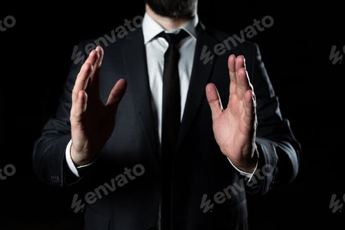 Preview: Businessman In Suit Holding New Important Message Between Hands.