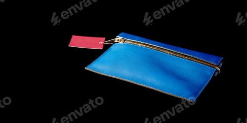 Preview: Blue small female bag on the black background