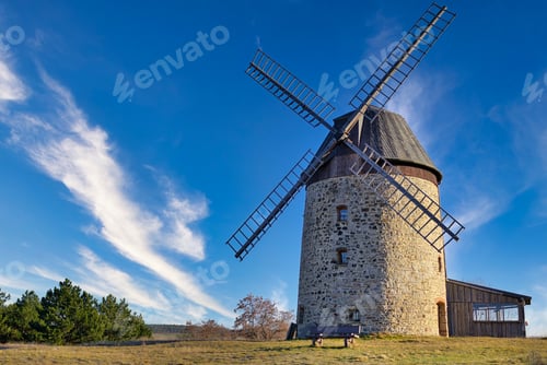 Preview: Windmill in the field in the daytime.