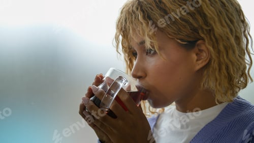 Preview: African American ethnic girl lonely lady female alone woman at home near window harmony calm