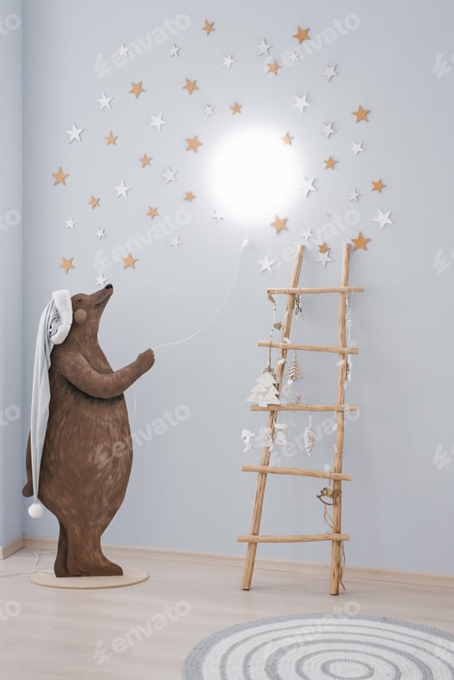 Preview: Creative lamp in the children's room. Drawn bear holding a rope with a lamp on the wall