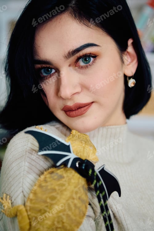 Preview: Beautiful Woman Posing with Her Adorable Bearded Dragon Pets