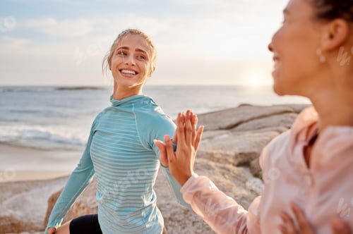 Preview: Fitness, touching hands and couple of friends at the beach for workout, training or exercise togeth