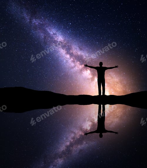 Preview: Milky Way and silhouette of a man near the lake