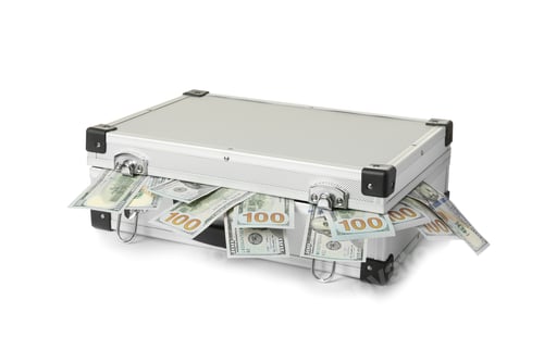 Preview: Hard case full of money on white background