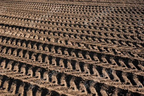 Preview: traces on the plowed land of the agricultural field