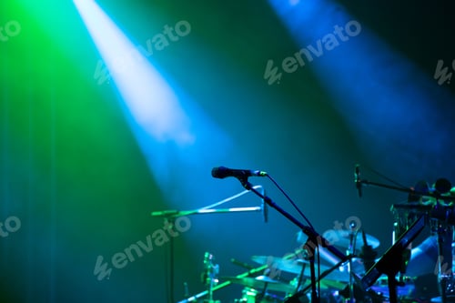 Preview: Colorful stage lights and microphone at concert