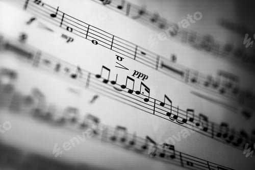 Preview: Aged sheet of paper in the shape of a cross, with musical notes drawn onto the surface