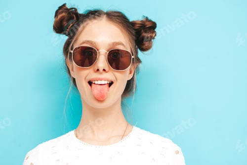 Preview: Young beautiful funny woman posing in studio