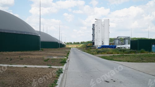 Preview: Biogas. Modern bio comlex. Renewable energy from biomass. Innovative biogas plant among green nature