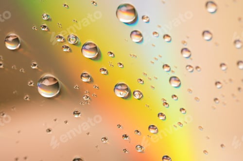 Preview: Water drops on glass surface in the sun