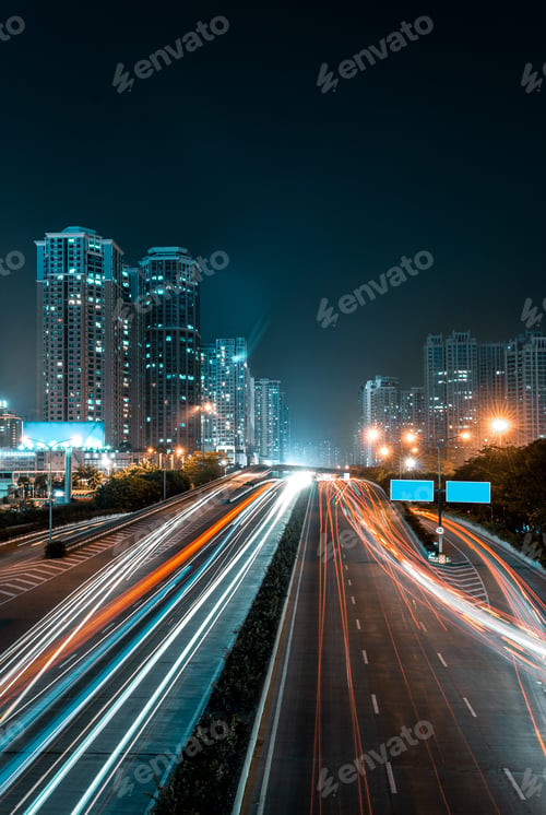 City Highway at Night with Light Streaks