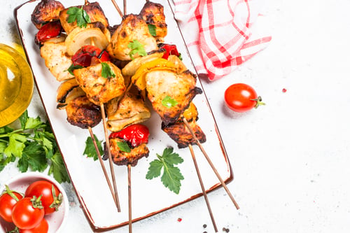 Preview: Chicken kebab on skewers on white