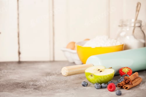 Preview: Mixed berries, baking ingredients and utensils