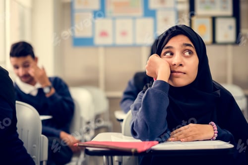 Preview: diverse muslim children studying in classroom