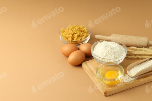 Preview: Concept of cooking with ingredients on beige background, space for text