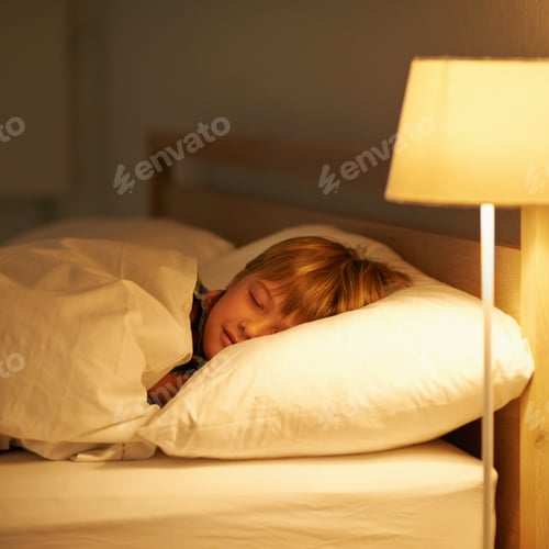 Preview: He always sleeps so peacefully. Shot of a young boy sleeping in bed.