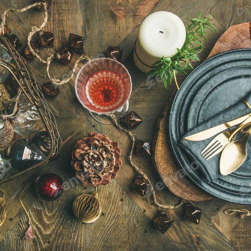 Preview: Christmas or New Year holiday table setting with rose champagne