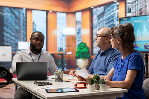 Preview: Elderly couple receiving professional advice from a financial planner