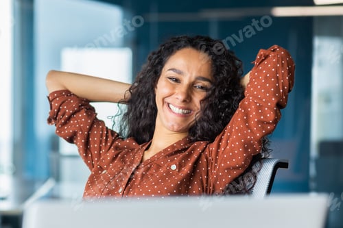 Preview: Happy and smiling successful hispanic business woman finished work satisfied with work result and