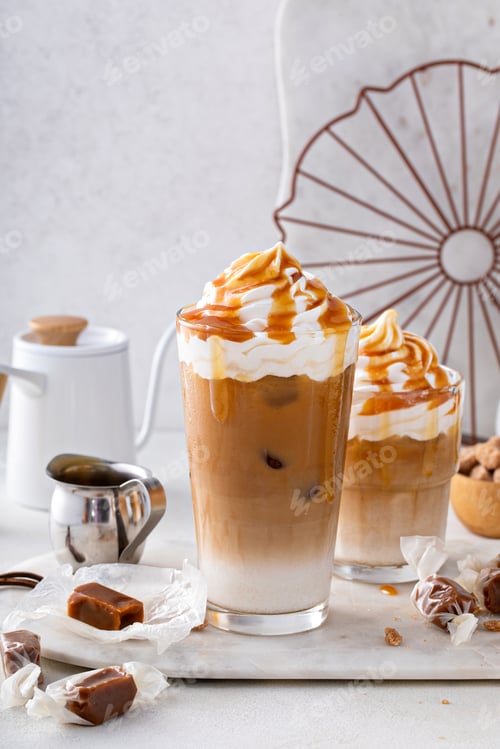 Preview: Iced caramel latte topped with whipped cream and caramel sauce