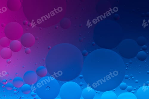Preview: Beautiful abstraction of liquid colors gently blending together in slow mixing flow