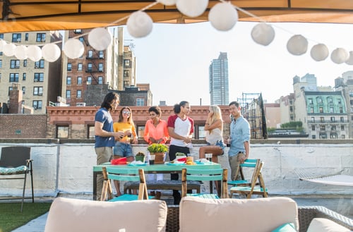 Preview: Group of friends having party on a rooftop