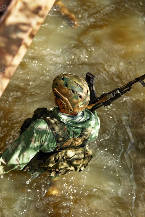 Preview: Full military experience - One day commando - running through the water with automatic rifle replica