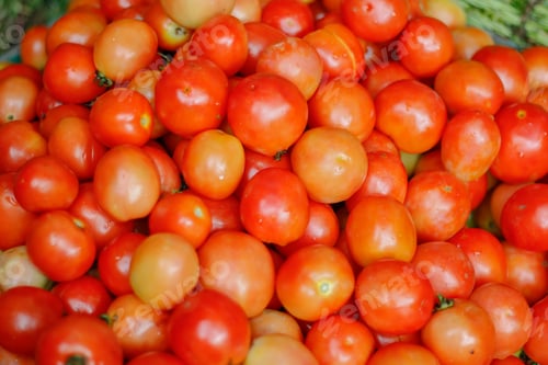 Preview: Top view of a basket filled with red ripe and fresh tomatoes