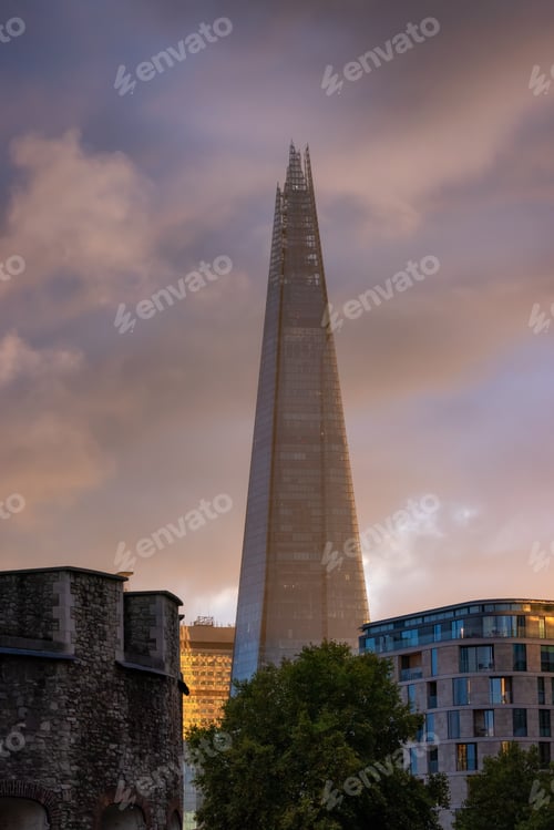 Preview: Modern Architecture Building during dramatic sunset. City of London