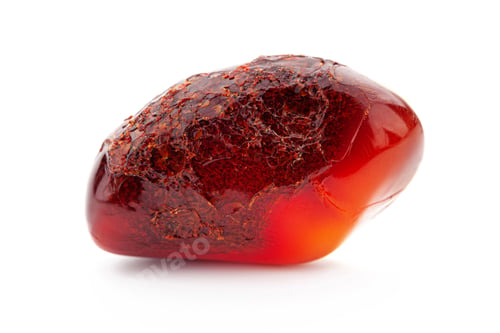 Preview: Natural amber. A piece of yellow opaque natural amber on white background
