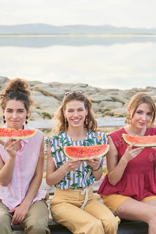 Preview: Girlfriends Eating Watermelon Outdoors