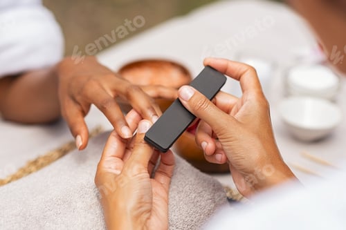 Close-Up of Manicure with Nail File