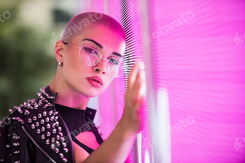 Preview: Beautiful woman illuminated by led lights
