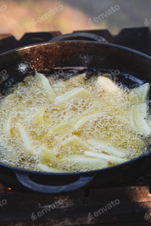 Preview: process of cooking french fries on a fire