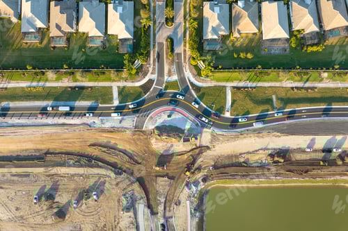 Preview: Industrial construction roadworks at roundabout intersection with moving cars in Venice