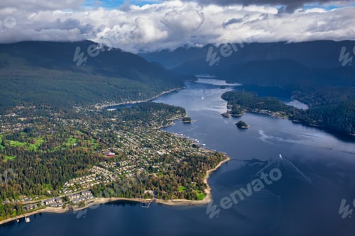 Preview: Aerial view of an Ocean Inlet in a modern city during a cloudy morning