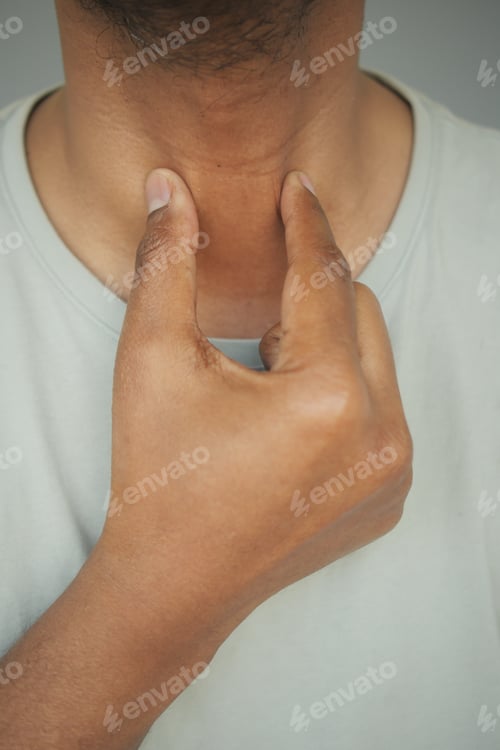 Preview: Checking pulse on neck in a calm setting indoors