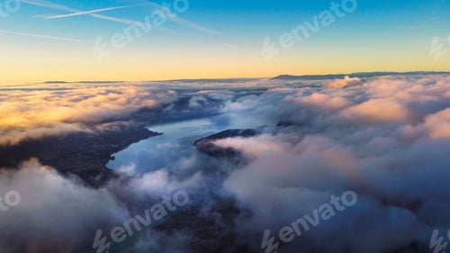 Preview: Aerial view of clouds over the mountains with a sky background