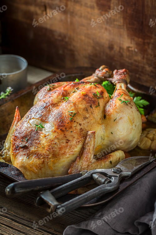 Preview: Grilled chicken with herbs and vegetables. Roasted chicken with herbs.