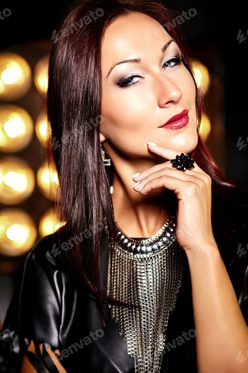 Preview: Portrait of young beautiful woman posing in studio