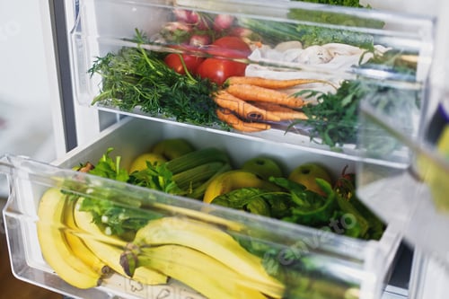 Preview: Zero waste grocery in fridge. Fresh vegetables in opened drawer in refrigerator