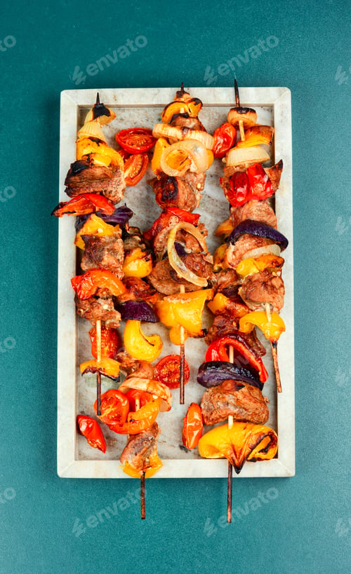 Preview: Set of delicious grilled kebabs on skewers.