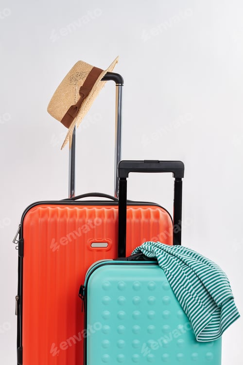Preview: Suitcases and clothes for journey